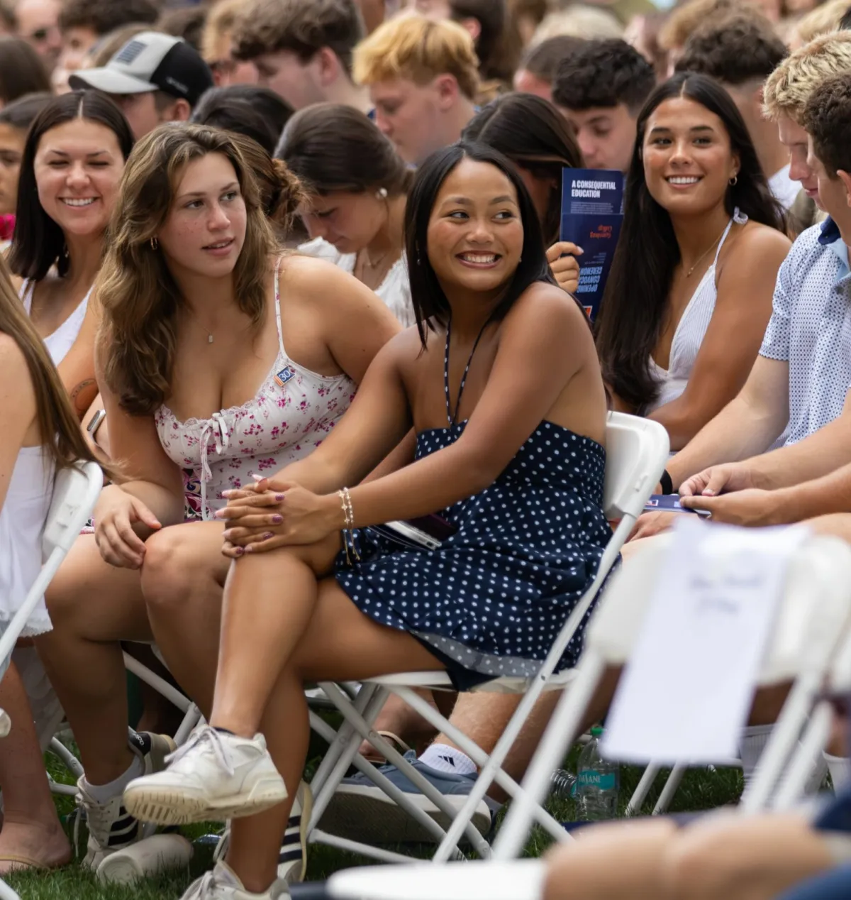 students smile in seats