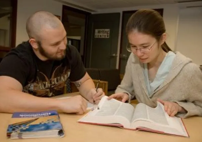 Two students working in the Writing Center.