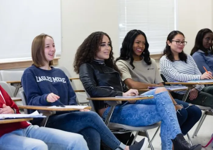 A group of students sitting in the classroom