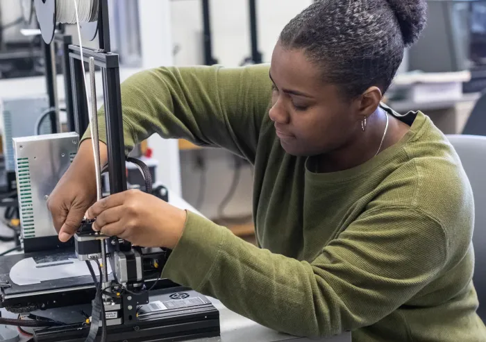 A student works on a project as part of the Creativity, Entrepreneurship, and Innovation Pathway.
