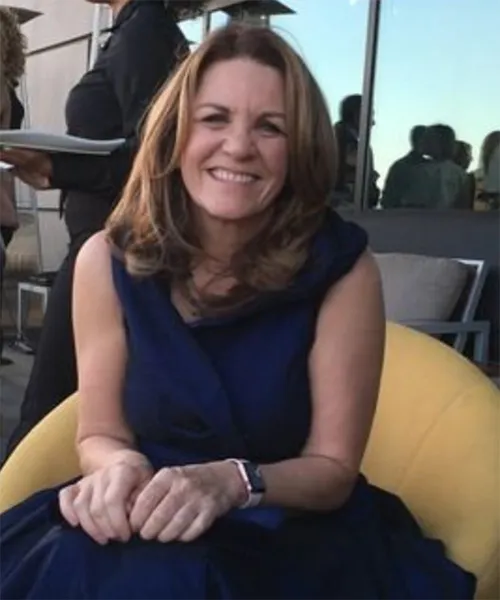 woman smiles at camera