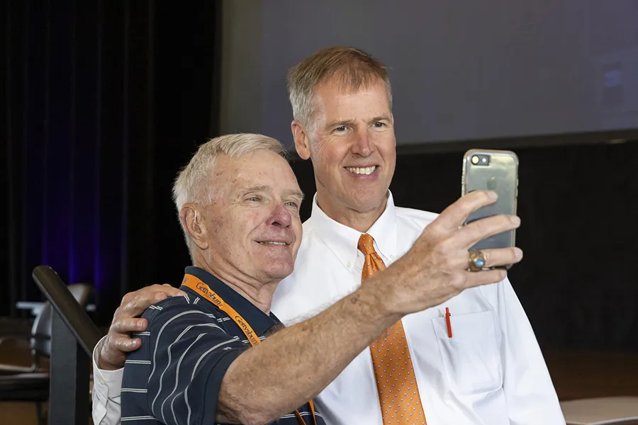 Joe Lynch ’85 takes a photo with Doug Goodfellow ’68 during Reunion Weekend