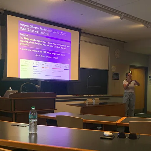 An image of Liz Callan ’26 practicing her presentation