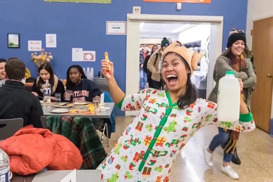 A student poses during Servo Thanksgiving in Fall 2019