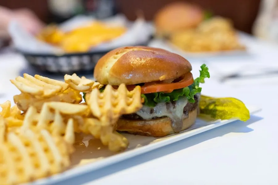 A burger and waffle-cut fries at Blue & Gray Bar & Grill