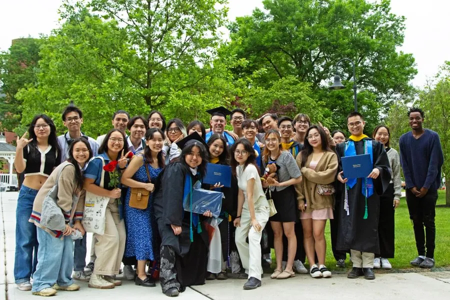 An image of  Brad Lancaster (middle) with a group of students