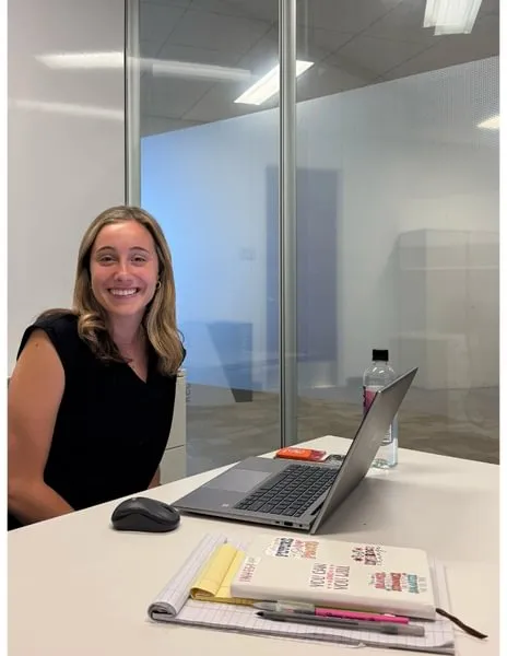Julie Breedveld ’26 gets ready for work during her Vanguard Business Leadership Internship program.