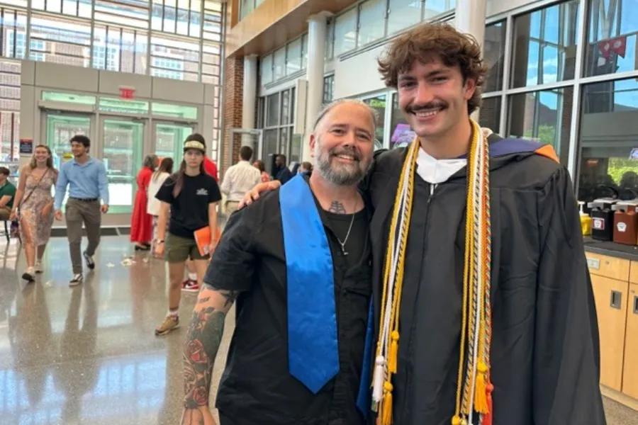  Ryder Hobbs ’25 presents his Stole of Gratitude to Prof. Vernon Cisney