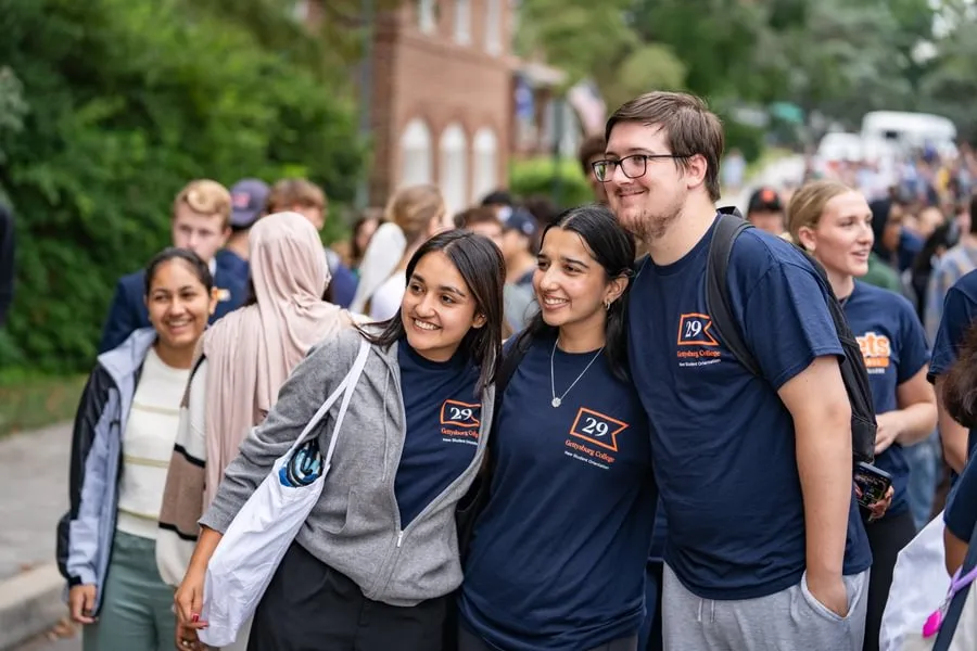 Bishruti Rijal ’26 gathers with friends before the start of the First-Year Walk for the Class of 2029.