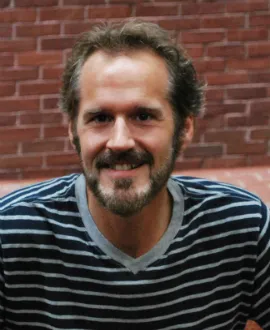Headshot of Devin McKinney