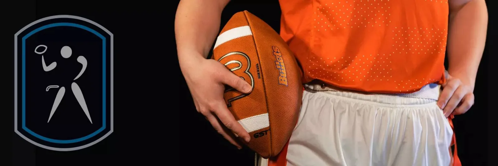 Gettysburg College basketball player holding a basketball.