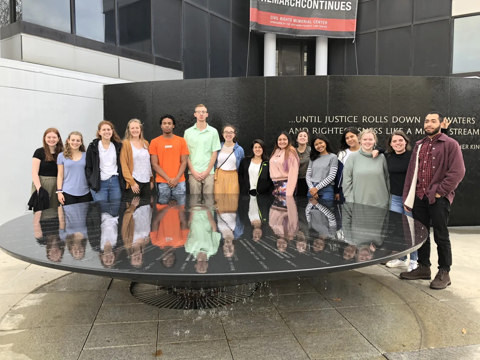 A group of students stand outside the Civil Rights Memorial Center in Montgomery, Alabama.