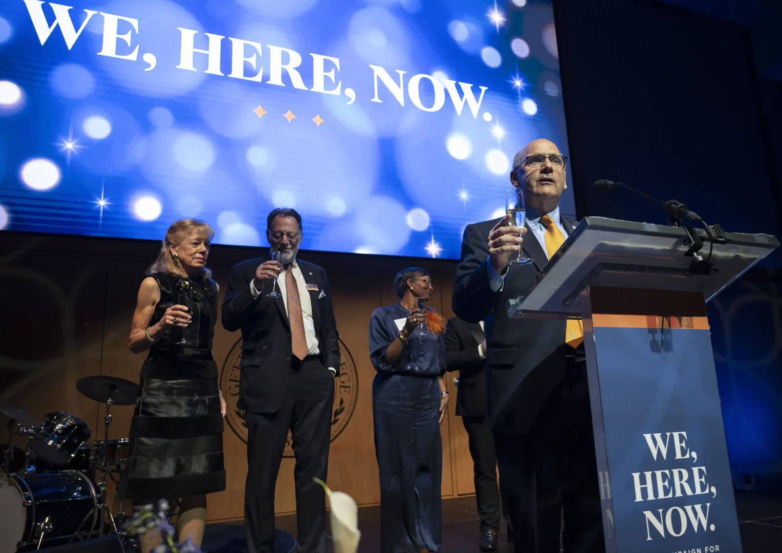 President Bob Iuliano, campaign co-chairs Daria Lo Presti Wallach ’76 and Bill Heyman ’74, P’13, and Board of Trustees Chair Lauren Wise Bright ’90 share a toast to celebrate the public launch of the campaign (Photo by Jason Minick). 