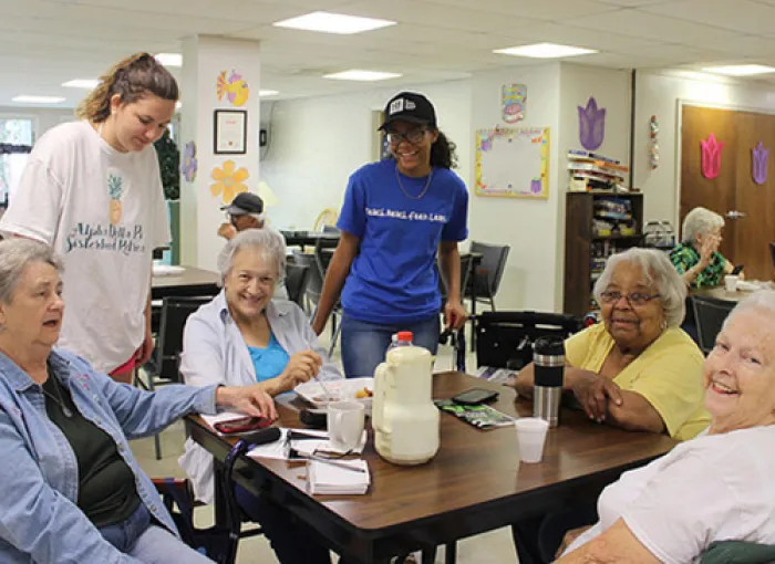 A group of students volunteering.