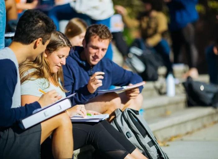 chemistry students study outside together
