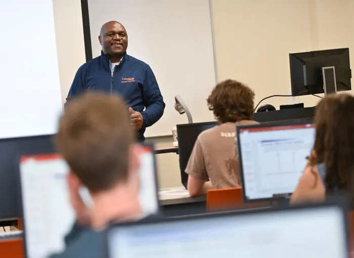 A professor teaches in his classroom.