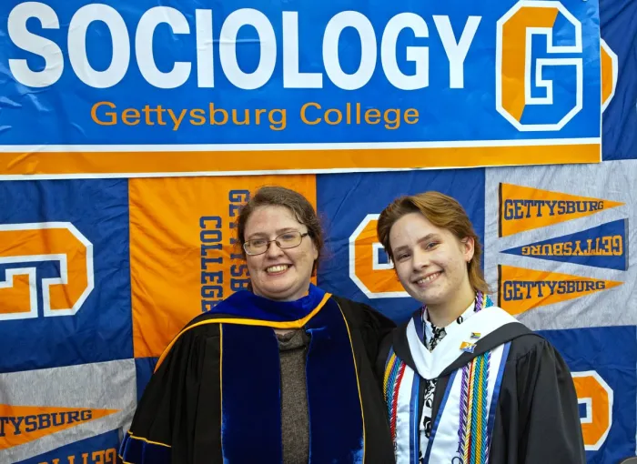 prof and student pose