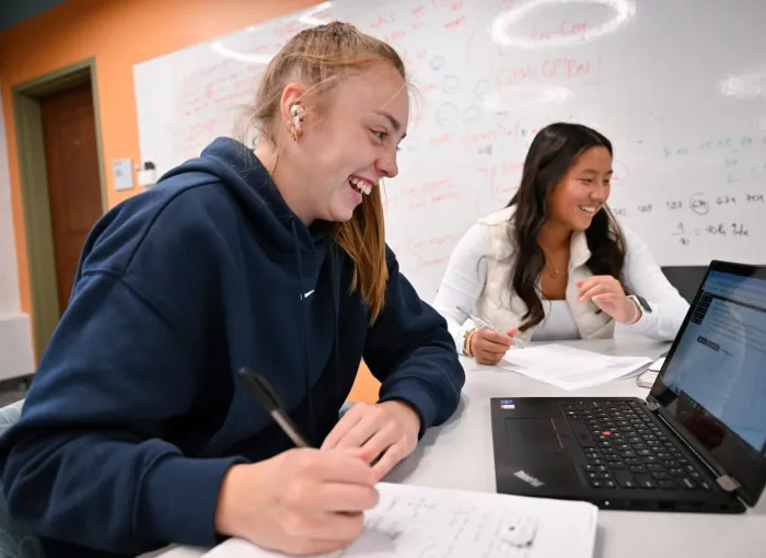 smiling doing math