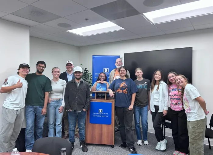 A group of students with their professor.