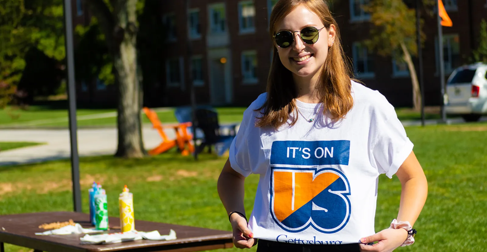Camille Traczek ’22 displays an It’s On Us T-shirt during the fall 2021 Week of Action 