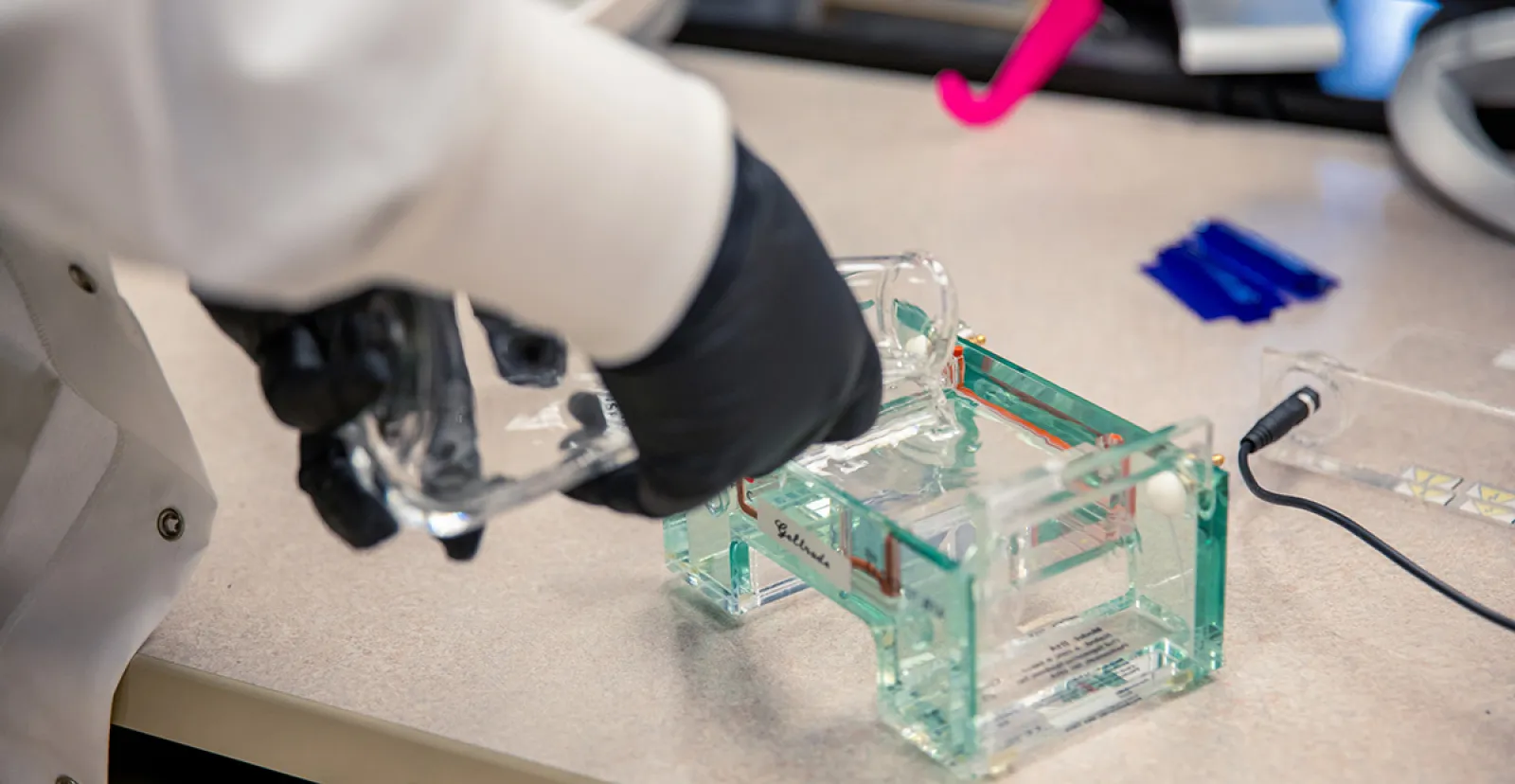 Physics Prof. Kurt Andresen in a lab
