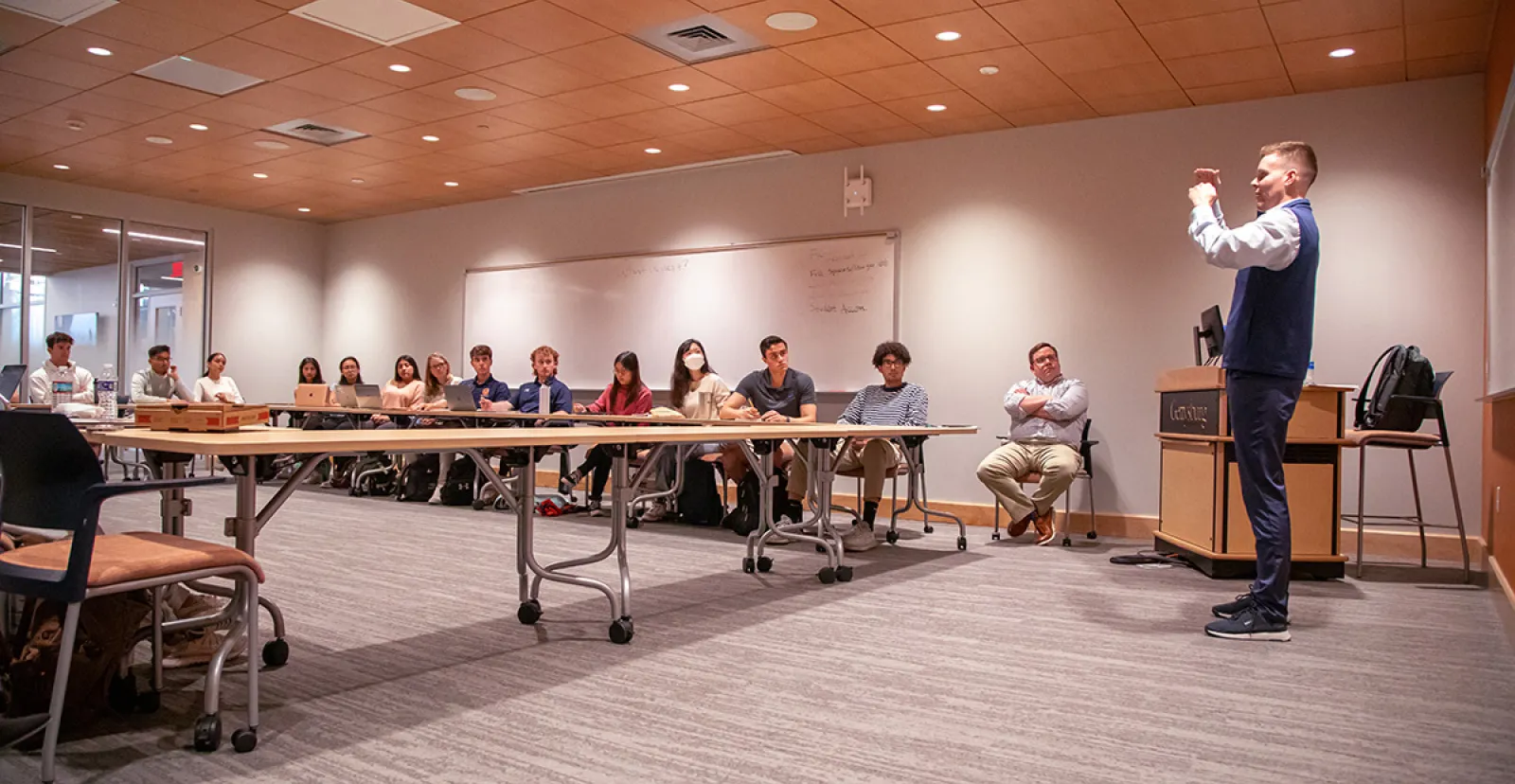 Richard Kampart speaking to a class 