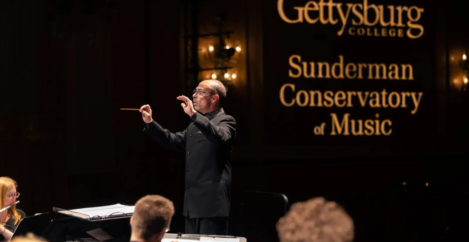 Russell McCutcheon conducting the Wind Symphony 