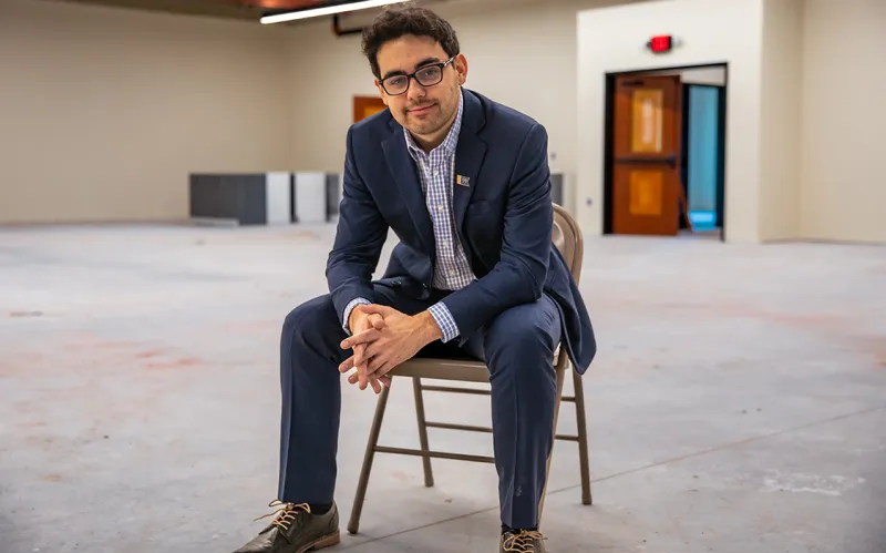 Adams County Historical Society Executive Director Andrew Dalton ’19 sits in a room
