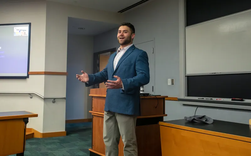 Justin Titchenall speaking to a class