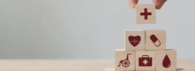 wooden blocks with medical icons